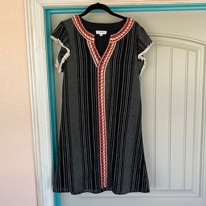 Black striped sleeveless dress with orange embroidery